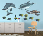 Load image into Gallery viewer, Playful Baby Dolphins Wall Decal (35 in. x 20 in.)
